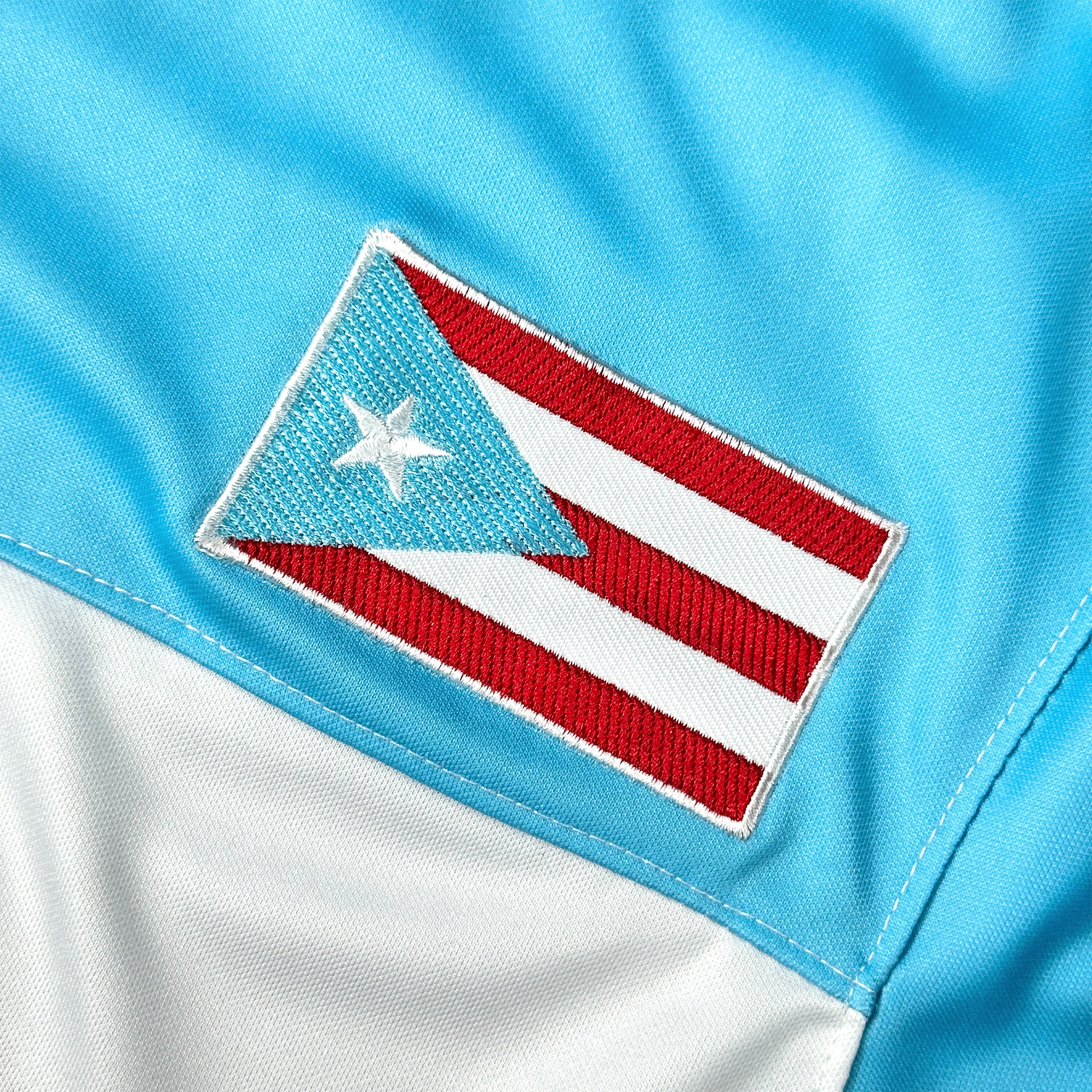 Puerto Rico Borinquen Heritage Azul Celeste Custom American Football Jersey Embroidered Closeup Flag