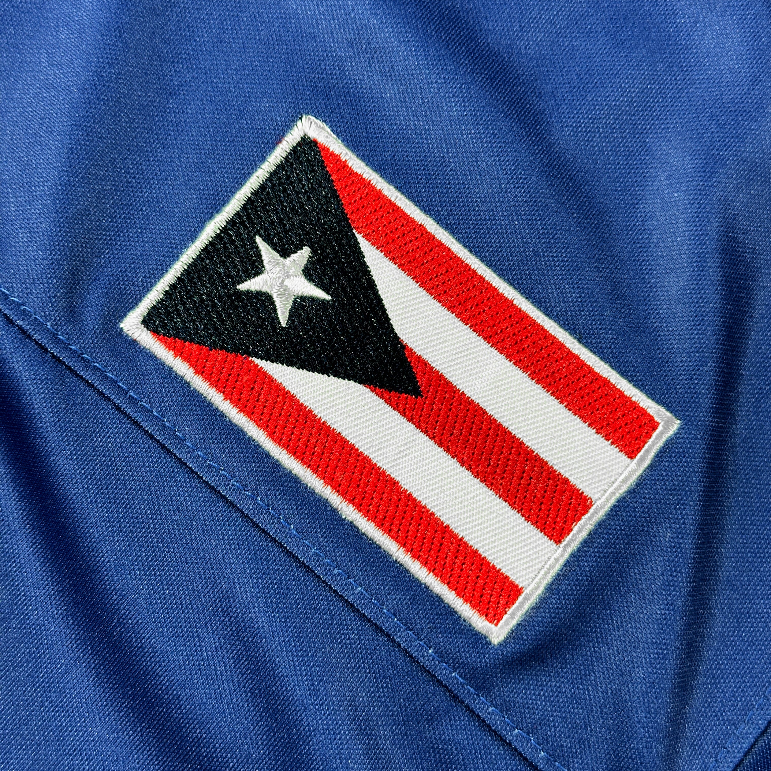 Puerto Rico Borinquen Heritage Navy Blue Celeste Custom American Football Jersey Embroidered Closeup Flag
